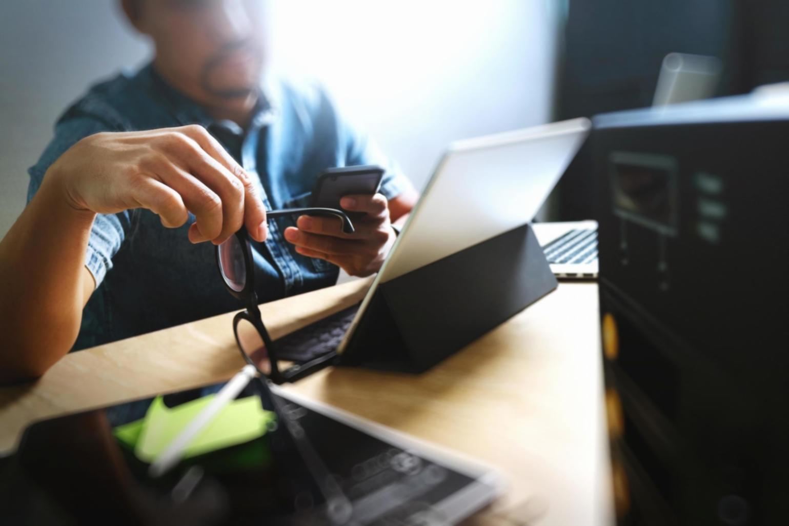 Students working on typography projects with before and after examples